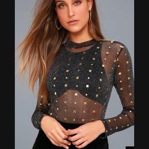 Gold and black mesh bodysuit